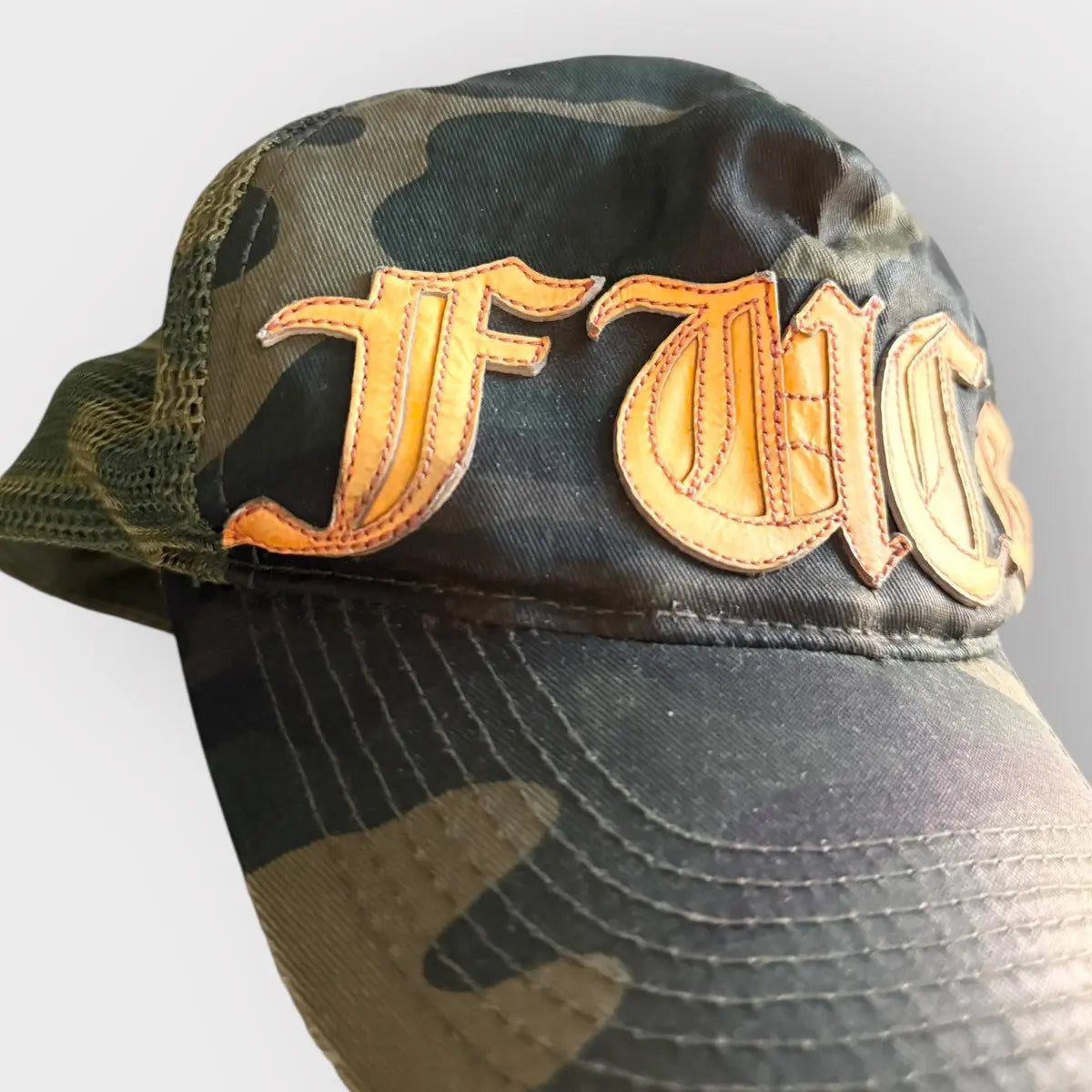 Chrome Hearts Fuck Leather Patch Camo Trucker Hat