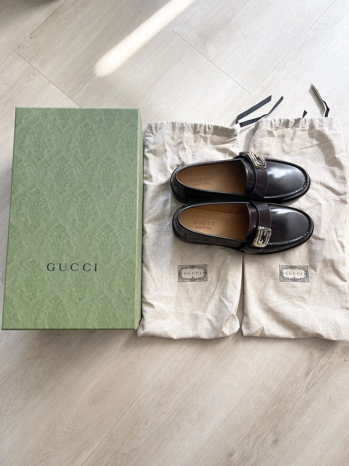 Gucci Logo Plague Leather Loafers