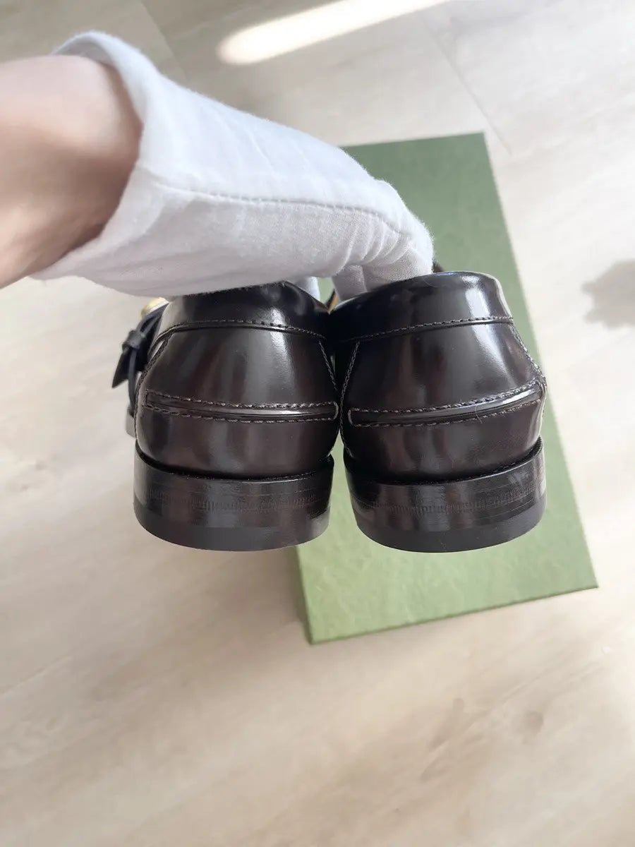 Gucci Logo Plague Leather Loafers