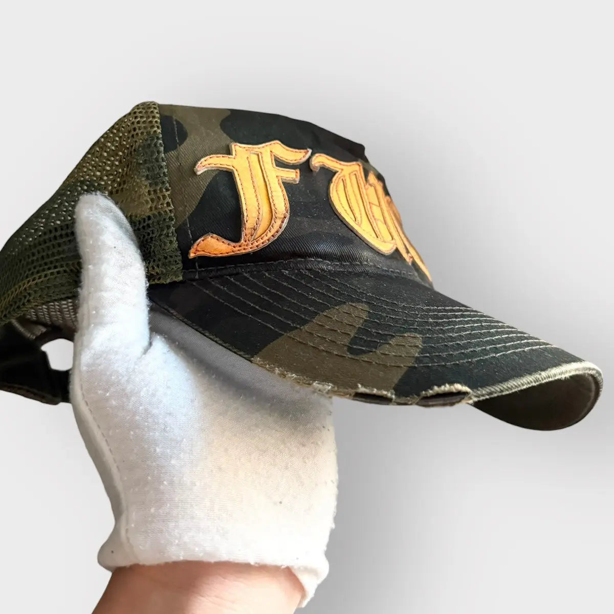 Chrome Hearts Fuck Leather Patch Camo Trucker Hat