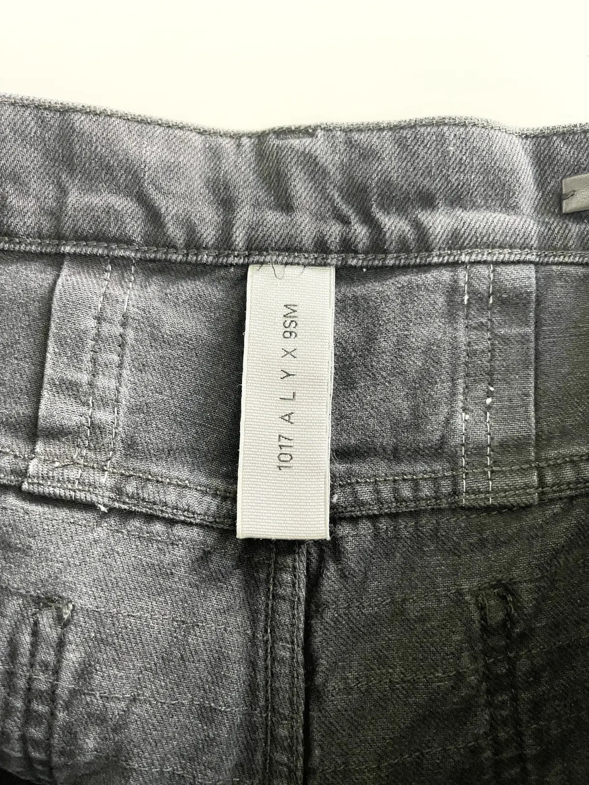 1017 ALYX 9SM X Blackmeans Distressed Flare Denim Jeans