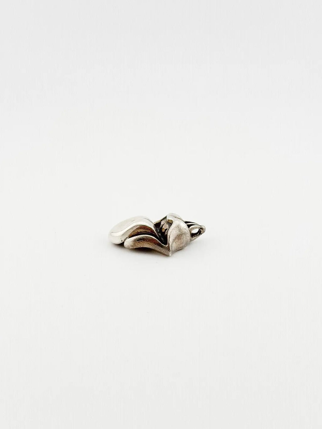 Chrome Hearts Rolling Stone Pendant