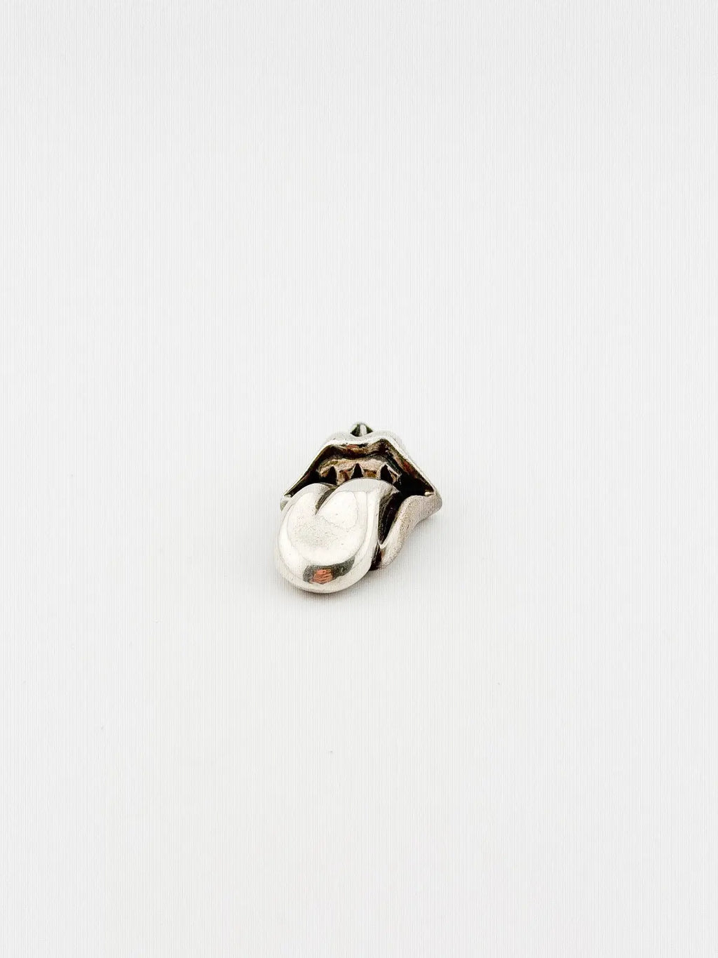 Chrome Hearts Rolling Stone Pendant