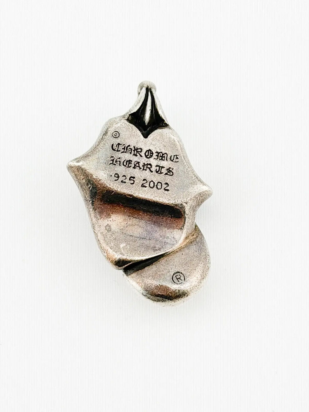 Chrome Hearts Rolling Stone Pendant